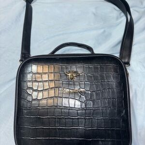 Alice Wheeler luxury black crocodile makeup bag